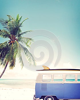 Vintage car parked on the tropical beach