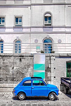 Vintage car vertical background in italy village selective color