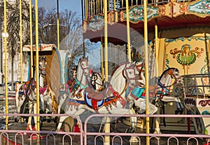 Vintage carousel horses closeup in winter