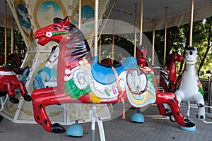 Vintage carousel in a summer park.