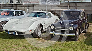 Vintage cars Fiat 500 Topolino and Chevrolet Corvette C3