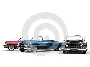 Vintage cars in various metallic colors