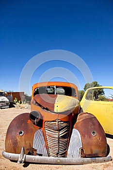 Vintage Cars Wreck at Solitaire Town, Sossusvlei in the Namib De photo