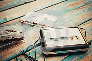 Vintage cassette player and audio cassette.