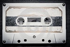 Vintage Cassette tape on a wood background with copy space