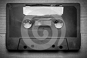 Vintage Cassette tape on a wood background with copy space