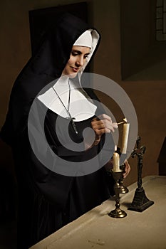 Vintage catholic nun at the altar