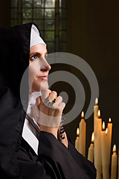 Vintage catholic nun with rosary