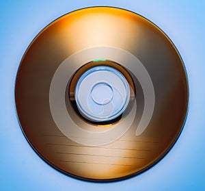 Vintage cd disk on blue background