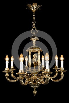 Vintage chandelier on black background, bronze antique chandelier with burning light bulbs, gold chandelier with light bulbs inclu