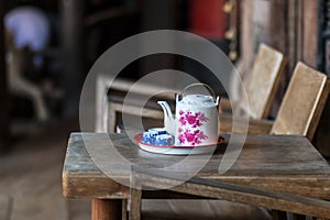 Vintage Chinese teapot and tea cups on wooden table,Chinese Tea photo