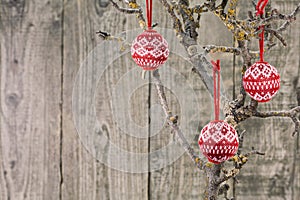 Vintage Christmas baubles over wooden background