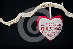 Vintage Christmas decorations hanging from tree branch with copy space