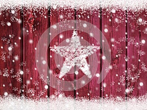 Christmas winter holiday snow star background with snowflakes on wooden texture with snow frame