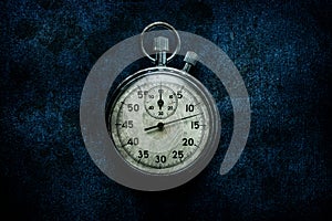 Vintage chronometer dark grunge background