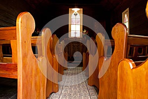 Vintage church aisle with pews and altar