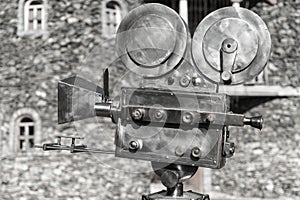 Vintage Cinema camcorder against the background of the castle walls