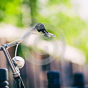 Vintage city bike colorful retro light and handlebar photo