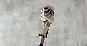 Vintage classic microphone on stage on white background. close up