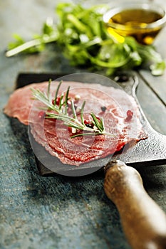 Vintage cleaver and Beef Carpaccio