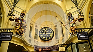 Vintage clock in an alley at shopping arcade