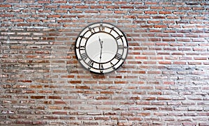 Vintage clock on brick wall background