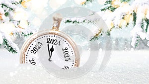 Vintage clock in the snow and points to the new year 2024. Beautiful winter background with fir trees and lights. New Year and