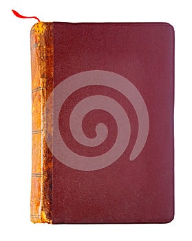 Vintage closed brown book with red bookmark