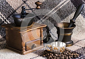 Vintage coffee mill with cup