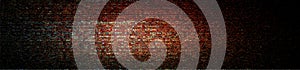 Vintage colorful brick wall texture for design. Panoramic banner background for your text or image.Panorama of black brick wall