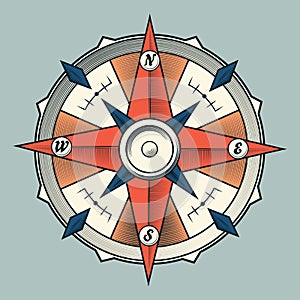 Vintage colorful graphic compass isolated on light background.