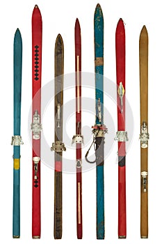 Vintage colorful used skis isolated on white