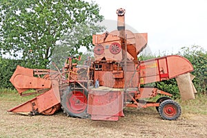 Vintage Combine Harvester in a field