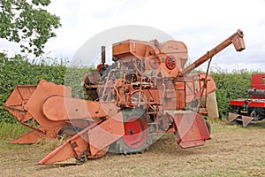Vintage Combine Harvester in a field