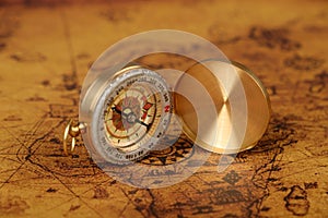 Vintage compass on old map - Explore the world-travel concept