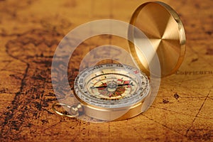 Vintage compass on old map - Explore the world-travel concept