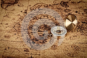 Vintage compass on old map - Explore the world-travel concept