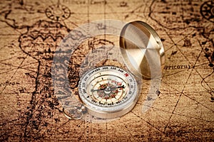 Vintage compass on old map - Explore the world-travel concept