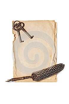 Vintage composition of paper sheets with quill pen and retro keys