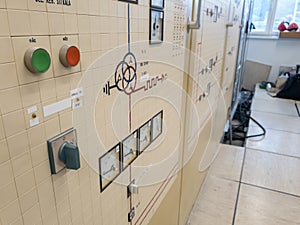 Vintage control and protection panels of power plant with single line diagrams.