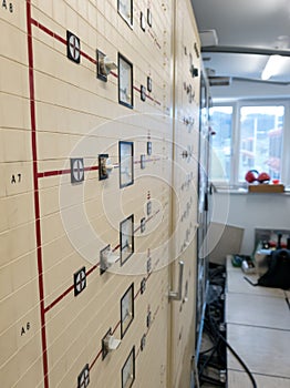 Vintage control and protection panels of power plant with single line diagrams.