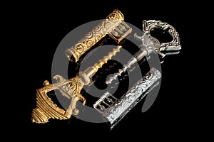 Vintage corkscrews in the form of a key on a black background