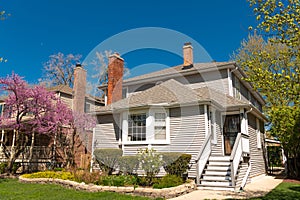 vintage cottage style home in residential neighborhood. neighborhood house architecture. modern cottage house. property
