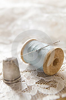 Vintage Cotton Reel With Needle And Silver Thimble