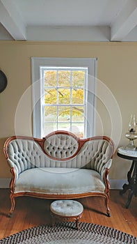 Vintage Couch with Footstool, Braided Rug