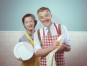 Vintage couple dish washing together