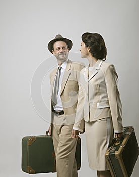 Vintage couple leaving for vacations