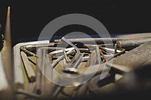 A tool tray filled with old hex wrenches