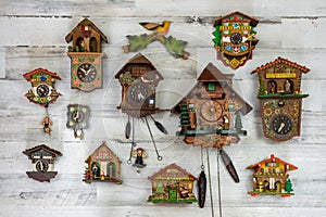 Vintage cuckoo clock collection on white background