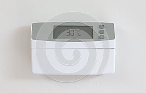 Vintage digital thermostat - Covert in dust - 30 degrees celcius photo